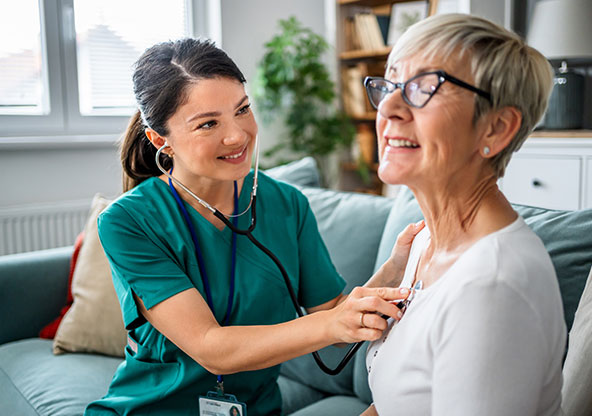 Doctor checking the lung health of a patient. 